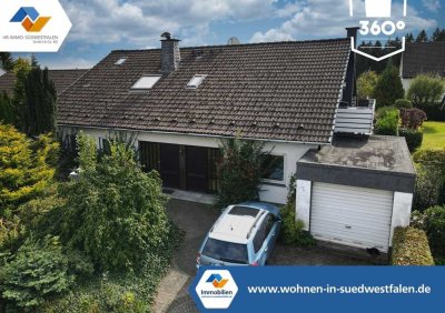 VR IMMO: Großes Einfamilienhaus mit ELW und zwei Garagen in beliebter Lage