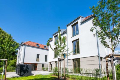 ZUHAUSE IM GLÜCK: Gartenwohnung mit offenem Grundriss, Parkett und wertiger Ausstattung