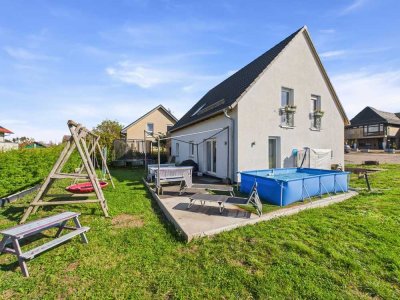 Familientraum mit Energieeffizienzklasse A+. 6 Zi., PV-Anlage, Terrasse, EBK, TLB, 2 SP, Home Office
