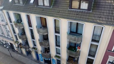 Entwicklungspotenzial � Attraktives Wohn- und Geschäftshaus mit Balkone 14 TG-Stellplätze!