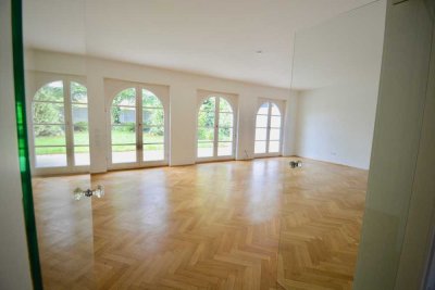 Stilvolle Hochparterre-Wohnung am Bökelberg mit Garten, Tiefgaragenplatz & zusätzlichem Gästebereich