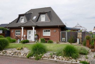 Wohnen und Wohlfühlen: Einfamilienhaus mit Gartenparadies