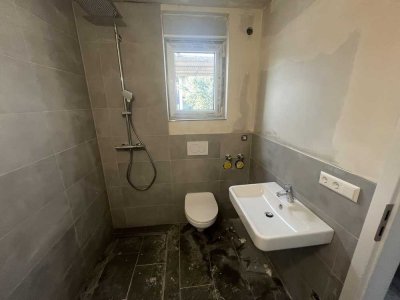 Traum für Paare und Familien! Kernsanierte 3,5 Zimmer mit Garten, Garage und Balkon