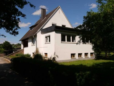 Vielseitiges (Mehr-)familienhaus in Hennef-Stein auf großzügigem Grundstück mit unverbaubarem Blick!