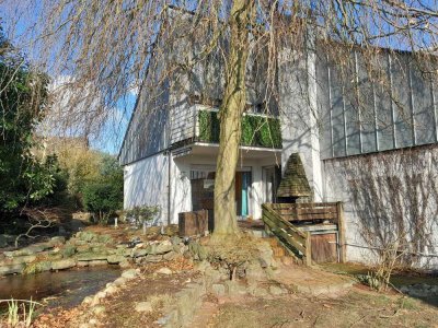 Flexibles Architektenhaus mit vielen Extras: Wellnessbereich, Sauna, Pool, Kamin!