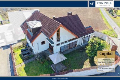 Großzügiges Ein-/ Zweifamilienhaus mit Einliegerwohnung in Feldrandlage
