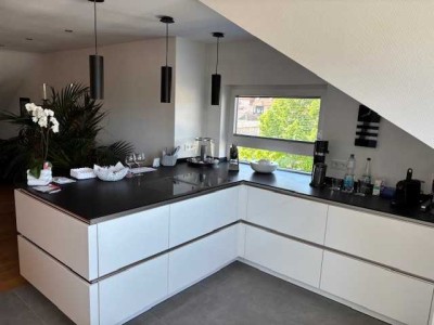 Exklusive 3-Zimmer-Dachgeschosswohnung mit Fernblick und Design-Charakter in Eltville