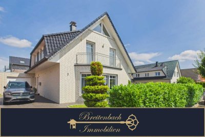 Achim – Uphusen • Modernes Einfamilienhaus mit Wintergarten & großem Garten