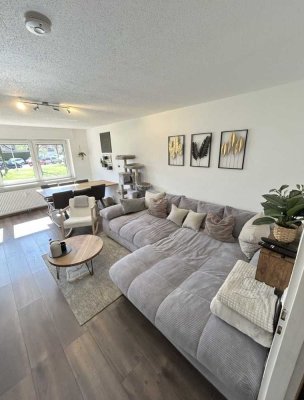 Charmante Hochparterre-Wohnung mit Balkon, Garage und EBK