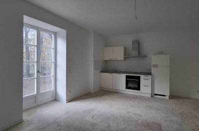 Modernes Appartement, Erstbezug mit Terrasse, EBK, Fussbodenheiz. PV Anlage