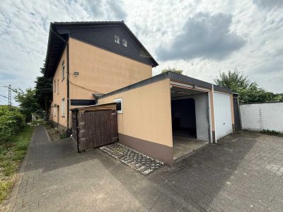 Großzügiges Zweifamilienhaus mit riesigem Garten, großer Einfahrt und umfangreichem Stellplatzangebo