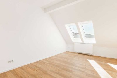 Zentral wohnen über den Dächern der Stadt im lichtdurchfluteten Erstbezug nach Sanierung