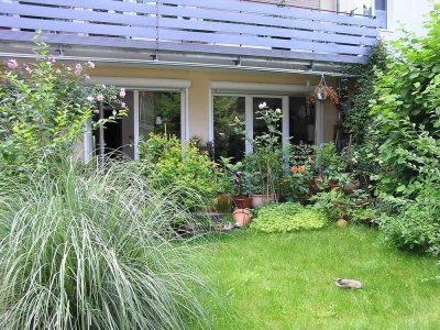 Souterrainwohnung mit großer Terrasse u.kleinem Garten.