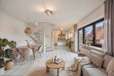 Charmante und gut geschnittene Maisonette-Wohnung mit Balkon in grüner Lage