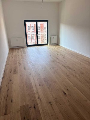 Helle goßzügige 2 Zimmer Wohnung mit EBK und Echtholzparkett im Industriedenkmal
