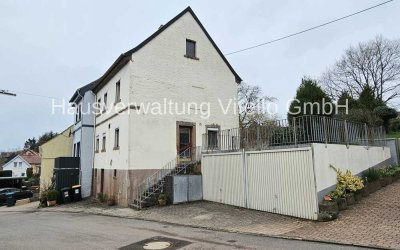 Handwerkertraum mit Perspektive – EFH mit Garten und zwei Garagen!