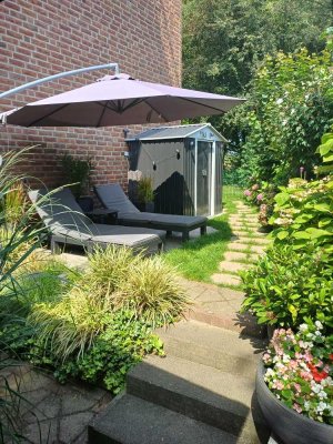 Sonnige Eigentumswohnung mit eigenem Wohlfühlgarten