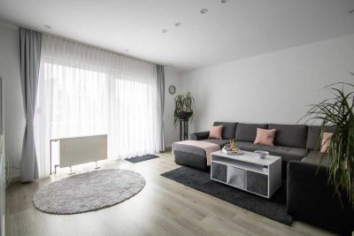 Modernisiert & vollvermietet – Mehrfamilienhaus mit Stellplätzen und Mietsteigerungspotenzial in