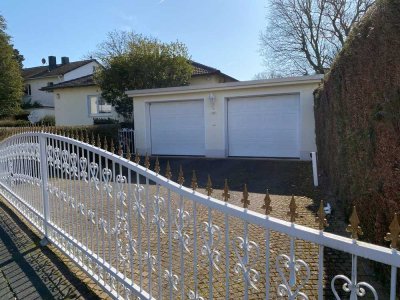 BAD HOMBURG Gonzenheim: Repräsentativer Walmdach-Bungalow mit Ausbaureserve in ruhiger Wohnlage!