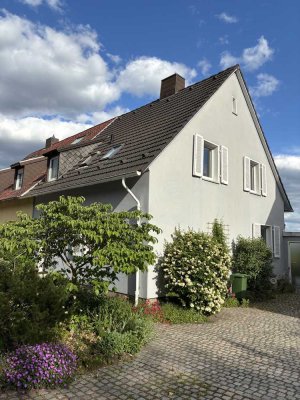 Gepflegte 4 Zimmer Doppelhaushälfte mit Terrasse, Garten, Sauna, Kaminofen und Garage zu verkaufen