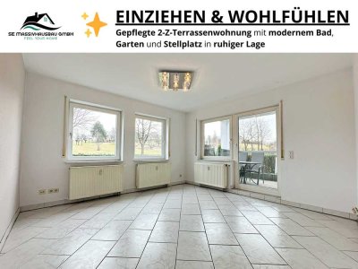 Charmante 2 Zimmer Terrassenwohnung mit Garten, Stellplatz und EBK in ruhiger Lage