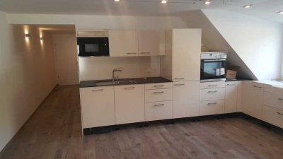 Zentrale, moderne und barrierefreie 2-Zimmer-Wohnung mit Blick auf Burghalde