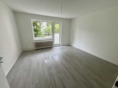 Renovierte 3-Zimmer-Wohnung mit Balkon und schönem Grünblick im 1. Obergeschoss