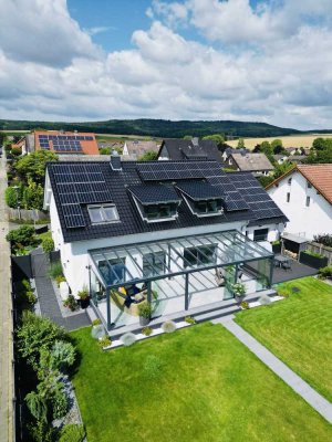 Luxuriöses energieeffizientes Einfamilienhaus mit Doppelgarage mit modernster Ausstattung – Ihr Trau