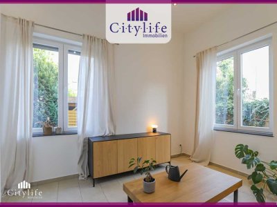 ...RÜCKZUGSORT MIT TERRASSE: NEUWERTIGE ERDGESCHOSSWOHNUNG MIT TOP AUFTEILUNG...