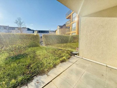 Helle 3-Zimmer-Wohnung mit eigener Grünfläche und Terrasse