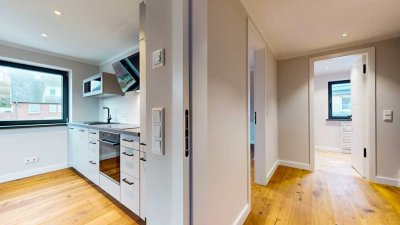 Hochwertige Neubauwohnung in strandnaher Lage mit Südbalkon