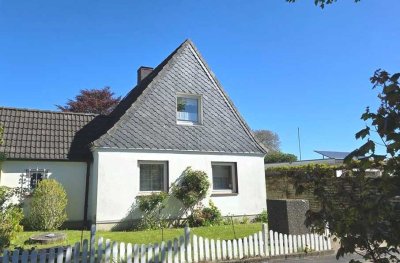 Charmante Doppelhaushälfte mit viel Potential in Lübeck-Travemünde