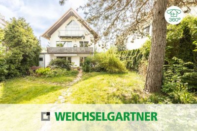 Eigentumswohnung mit herrlichem West-Garten, extra Hobbykeller und zwei Garagen