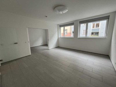 MODERNISIERTE UND RENOVIERTE 2,5-ZIMMER-WOHNUNG IM ERDGESCHOSS