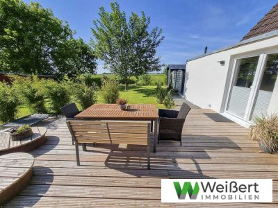 Wohnen, wo andere Urlaub machen – saniertes Einfamilienhaus mit 2.050 m² Grundstück, Sauna und Feldb