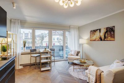 Erstbezug: Traumhaftes Penthouse-Apartment in Nymphenburg mit großem Westbalkon