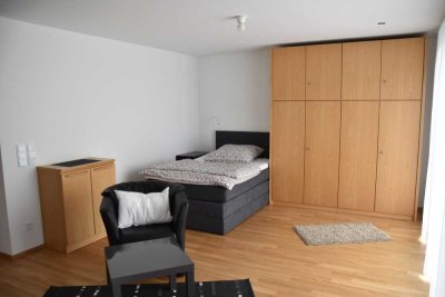 Wohnen in Toplage: Moderne möblierte 1-Zimmer-EG-Wohnung mit Terrasse