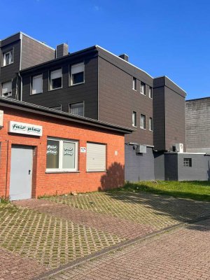 2 Wohnungen - 1 Gewerbeeinheit - 3 Garagen in Alsdorf Stadtmitte