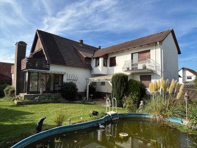 Zweifamilienhaus mit Sauna, Kachelofen und Schwimmteich in bester Lage von Obernkirchen