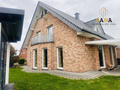 Verklinkertes Einfamilienhaus mit Doppelgarage in attraktiver Lage von Melle - Bennien