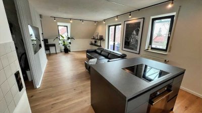 Attraktive 2-Zimmer-Dachgeschosswohnung mit Studio - Ideal für Kapitalanleger mit guter Rendite!
