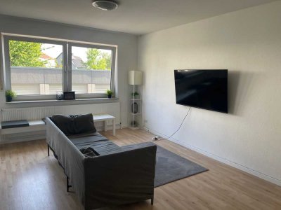 Wohnen + Gewerbe! Charmante 2-Zimmer-Wohnung mit Balkon & vermieteter Gewerbeeinheit