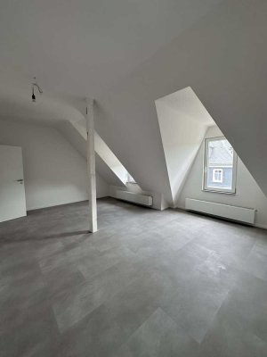 Traumhafte Dachgeschosswohnung mit Ausgebautem Spitzboden und Stellplatz