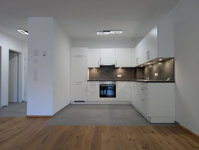 Geräumige 2-Zimmer-Wohnung mit Terrasse, Top-Ausstattung und Garagenstellplatz