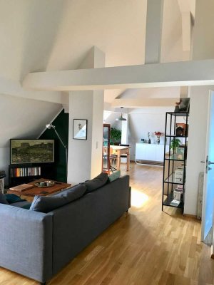 Lichtdurchflutete 3-Zimmer-Dachgeschosswohnung mit Balkon, zwei Bädern und offener Wohnküche