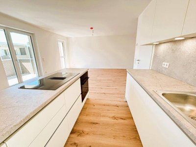 Erstbezug - 3-Zimmer-Wohnung mit Balkon und kleinem Eigengarten – ideal für Familien und Naturliebhaber