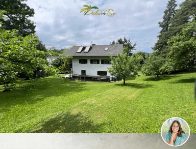 Stilvolle Dachgeschosswohnung mit großem Garten & Balkon