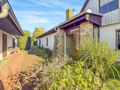 Familienparadies im Grünen: Doppelhaushälfte mit Wintergarten, Terrasse & 950 m² Grundstück