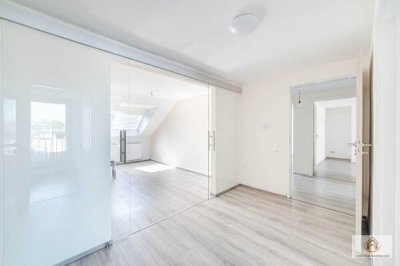 Lichtdurchflutetes Wohnerlebnis mit Weitblick – DG-Wohnung mit Dachterrasse
