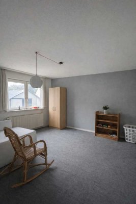 Zweifamilienhaus mit Potenzial für drei Einheiten und großzügigem Garagenbereich.